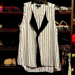 Woman’s My Michelle black and white stripped top. Size M